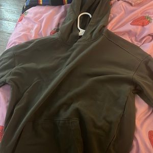 Plain green sleeveless hoodie